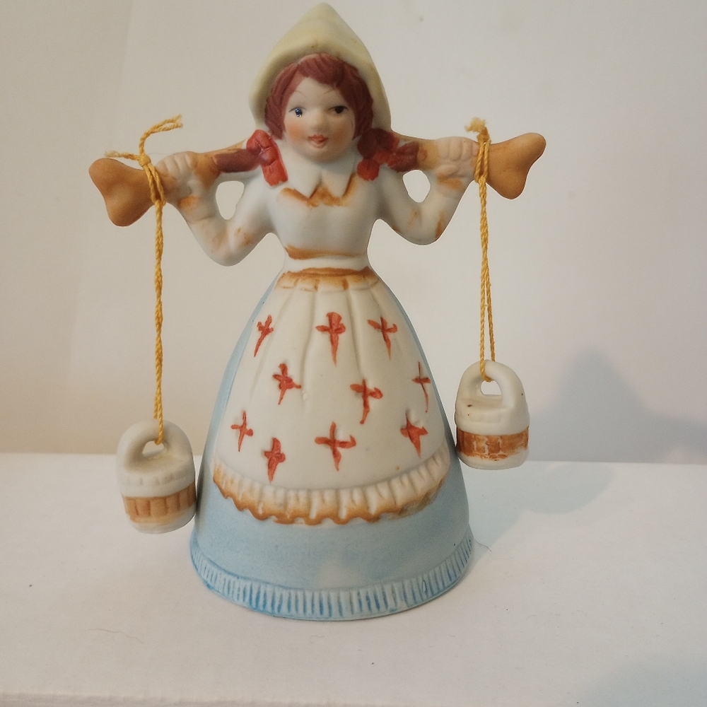 Bell, girl carrying buckets